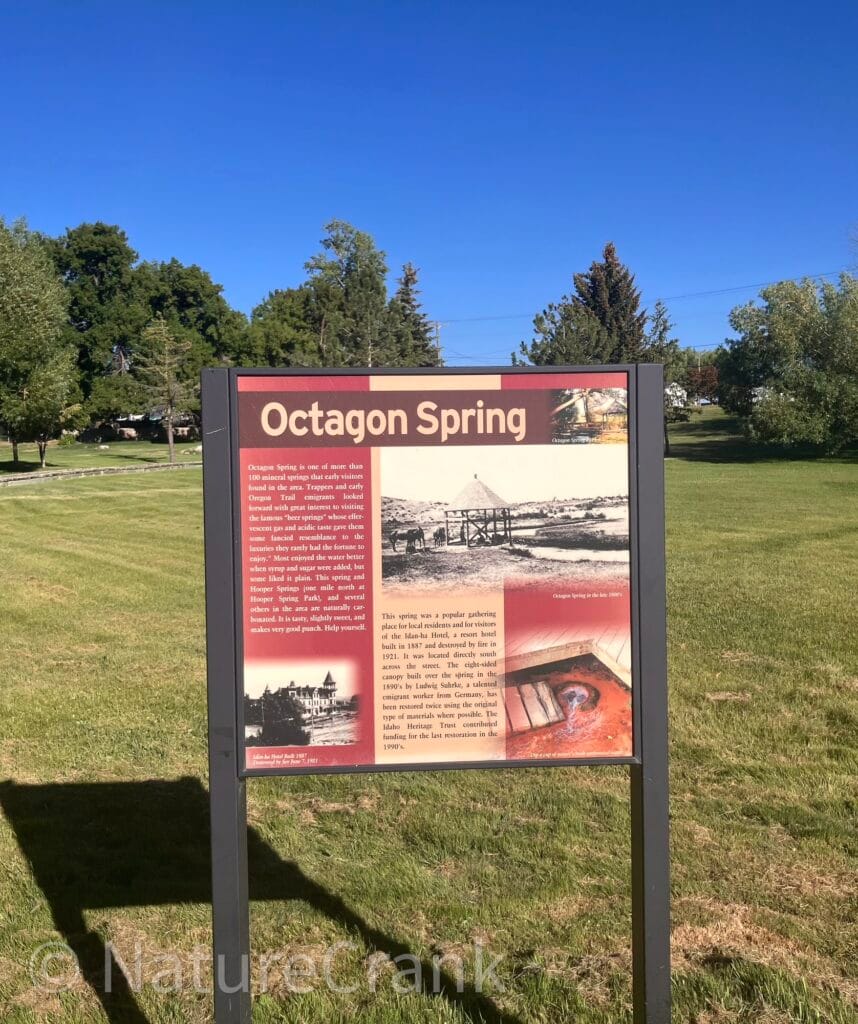 Interpretive historical sign at Octagon Spring Park detailing the history of the Oregon Trail and naturally carbonated water.