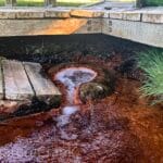 Close-up of naturally carbonated water bubbling in the mineral-rich Octagon Spring basin in Soda Springs Idaho.